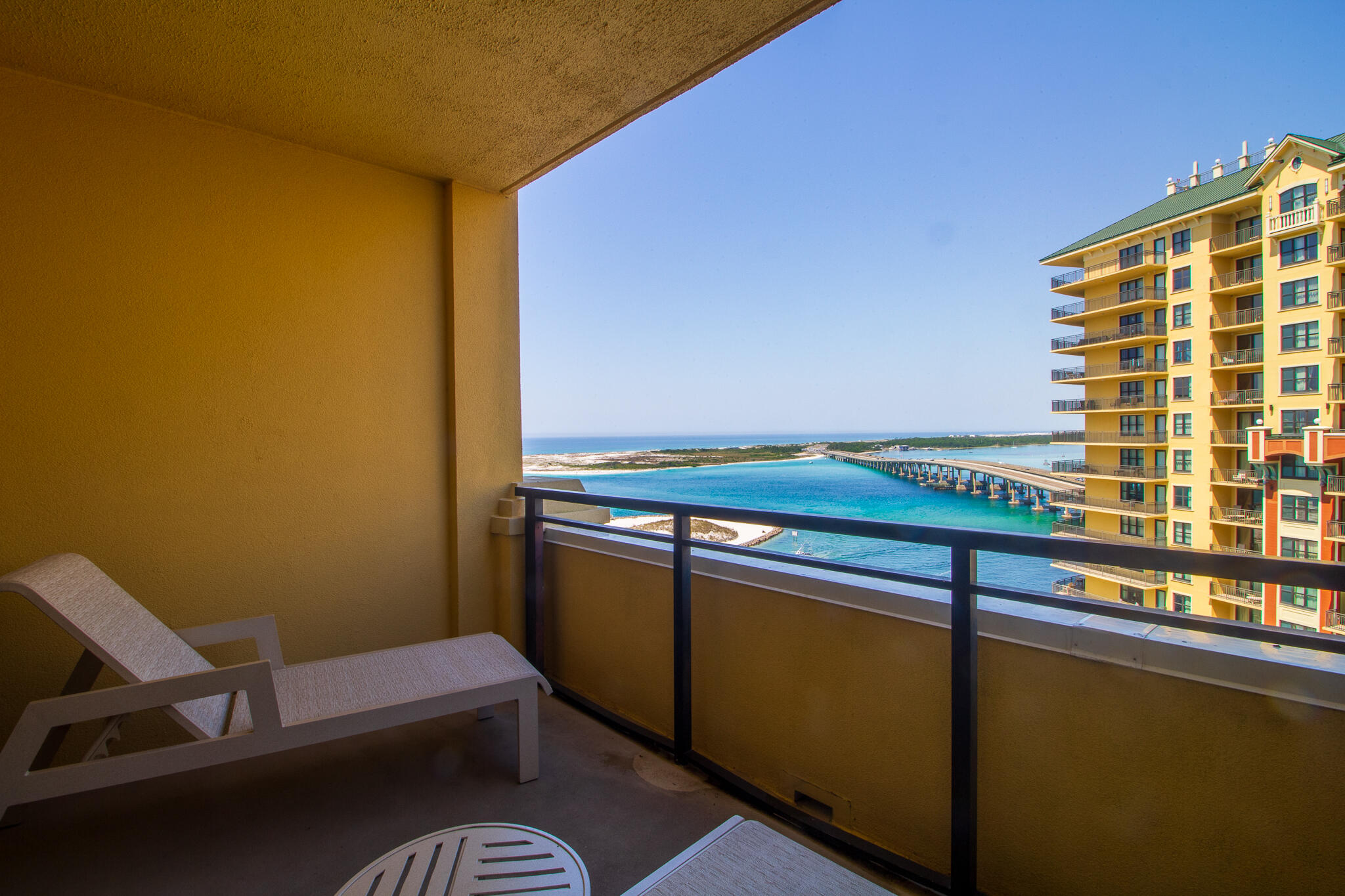 10 Harbor Boulevard, Unit E803G Destin, FL 32541 - Photo 12 of 28 a view of a balcony with chair and table