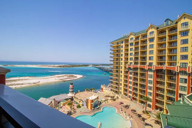 a view of a large building with a lake view