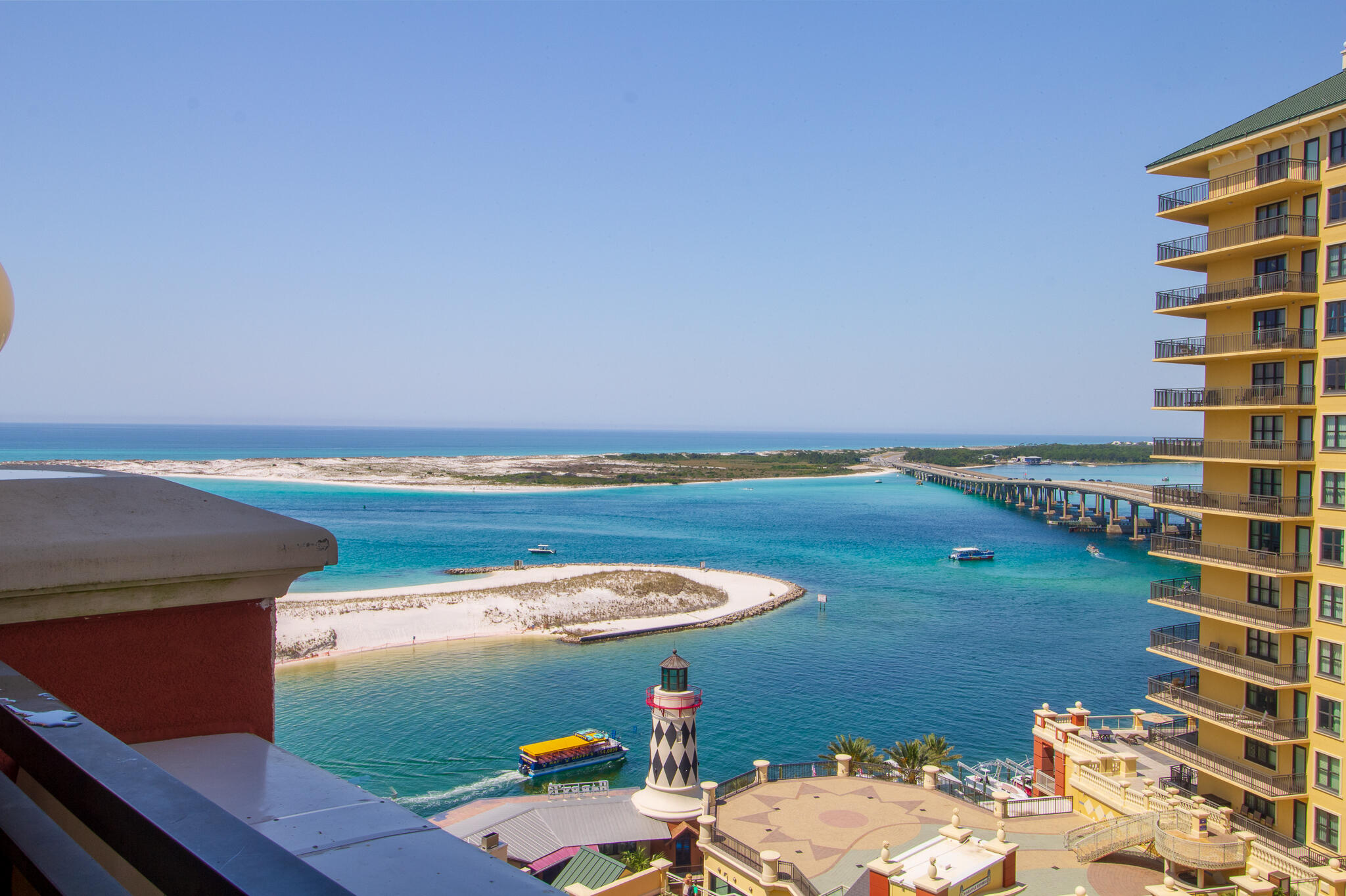 10 Harbor Boulevard, Unit E803G Destin, FL 32541 - Photo 10 of 28 a view of a balcony with chair and table