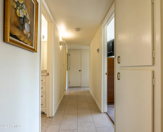 a view of a hallway with a door