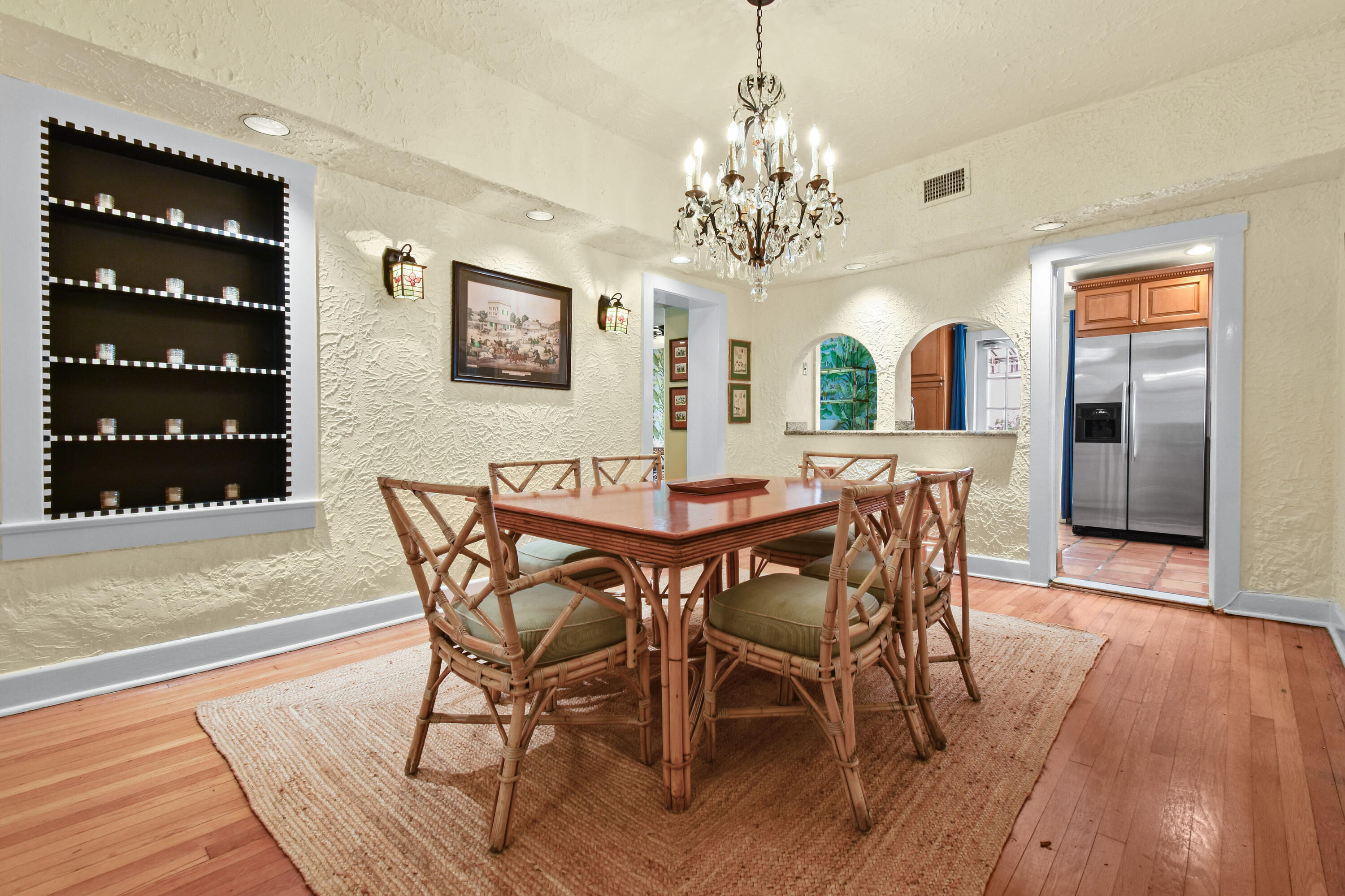 194 Almeria Road West Palm Beach, FL 33405 - Photo 11 of 67 a view of a dining room with furniture wooden floor and chandelier