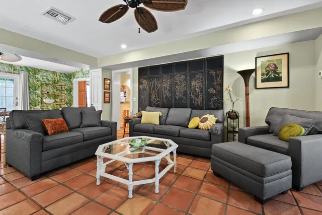 a kitchen with a sink cabinets and window