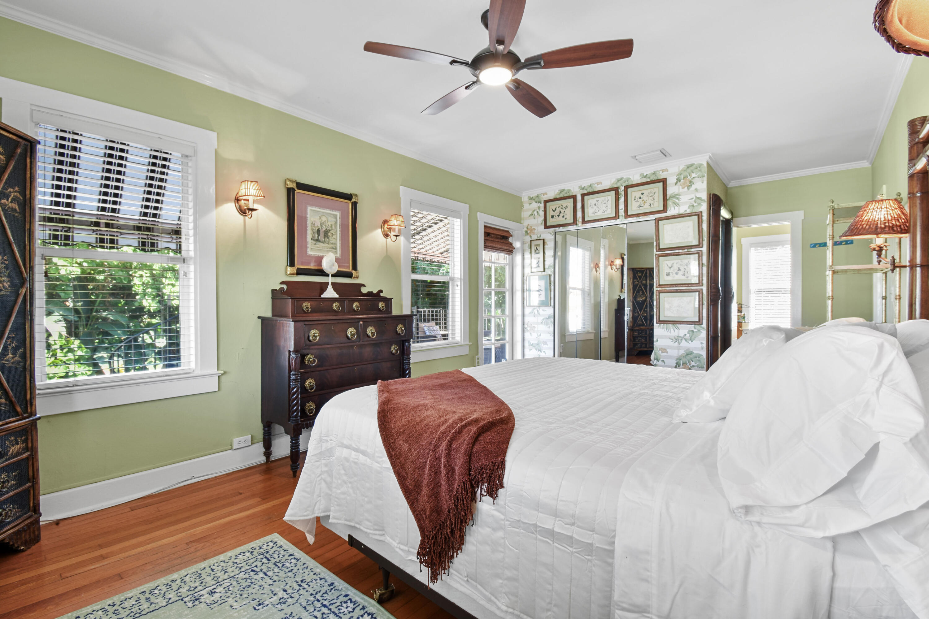 194 Almeria Road West Palm Beach, FL 33405 - Photo 36 of 67 a bed sitting in a spacious bedroom next to a window