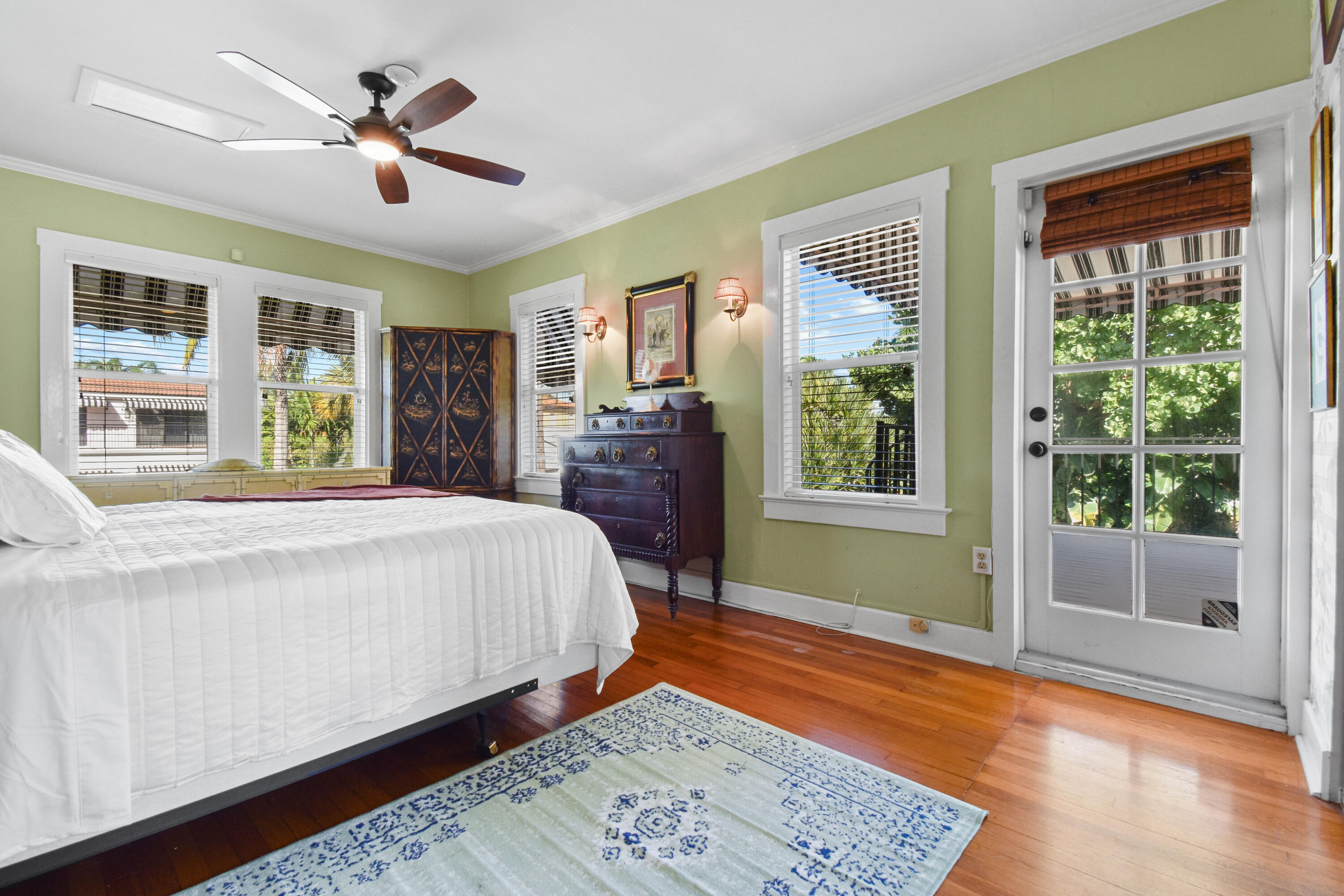 194 Almeria Road West Palm Beach, FL 33405 - Photo 39 of 67 a bed sitting in a spacious bedroom next to a window