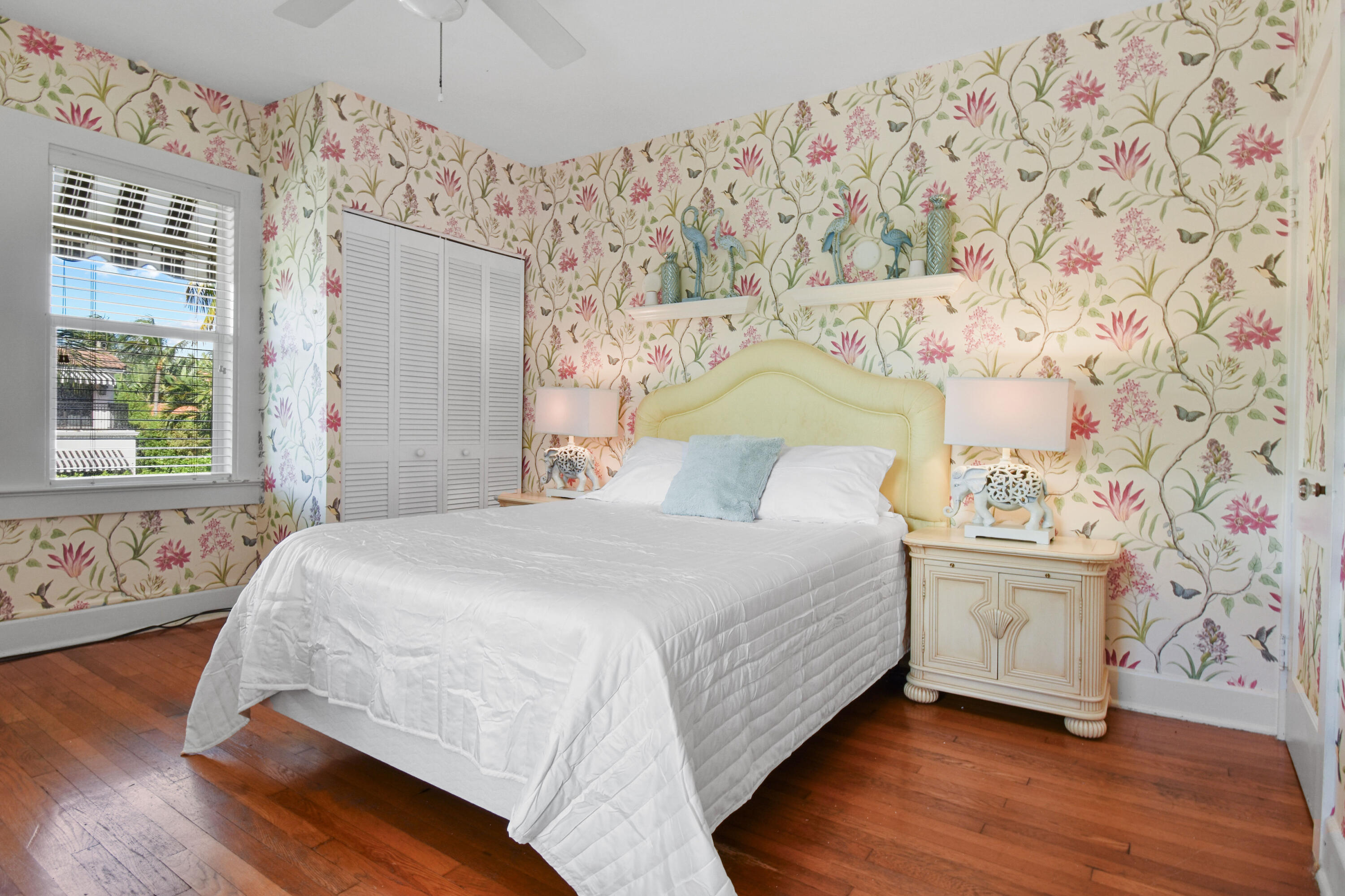 194 Almeria Road West Palm Beach, FL 33405 - Photo 45 of 67 a bedroom with a bed and a window