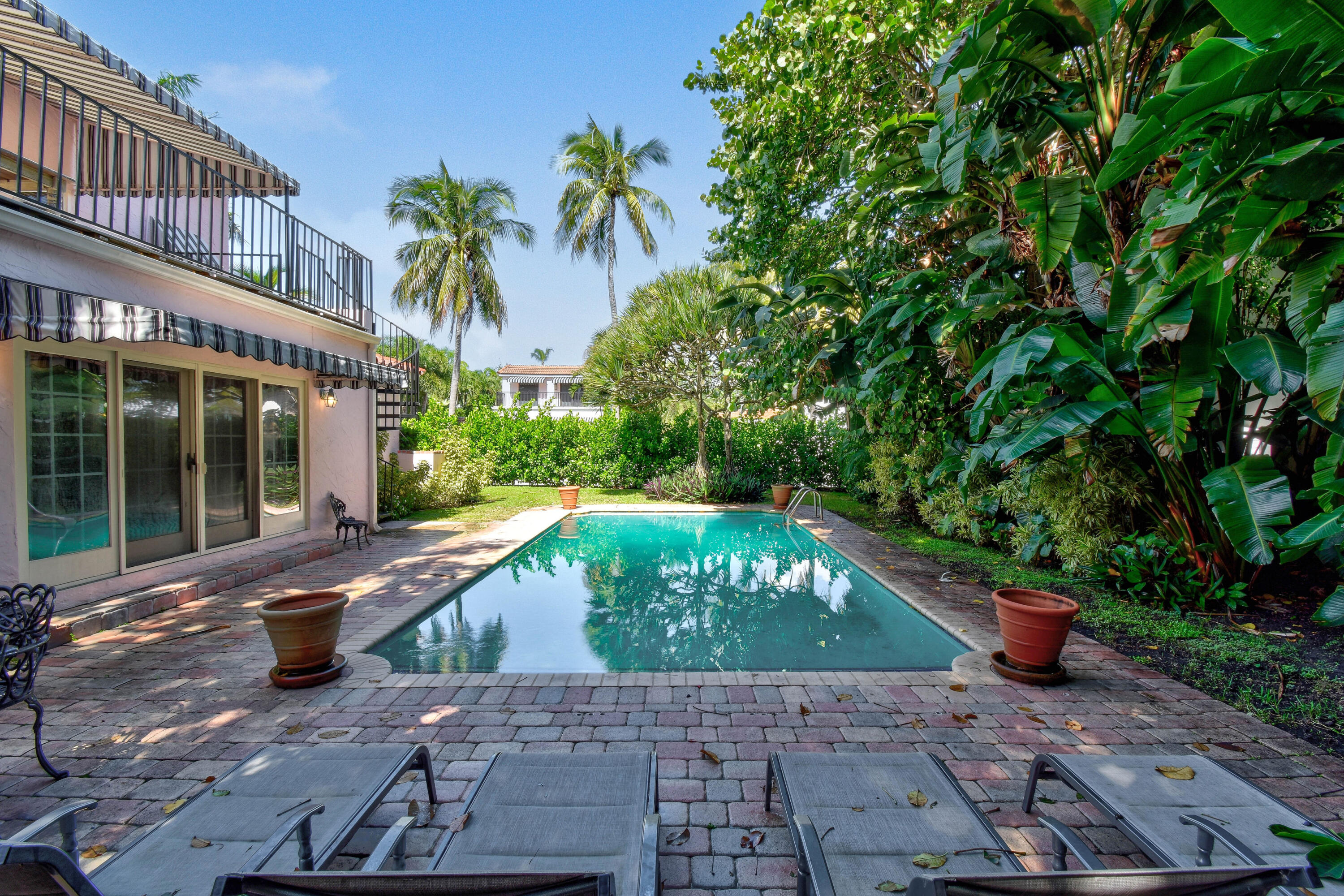 194 Almeria Road West Palm Beach, FL 33405 - Photo 65 of 67 a view of a house with backyard and sitting area