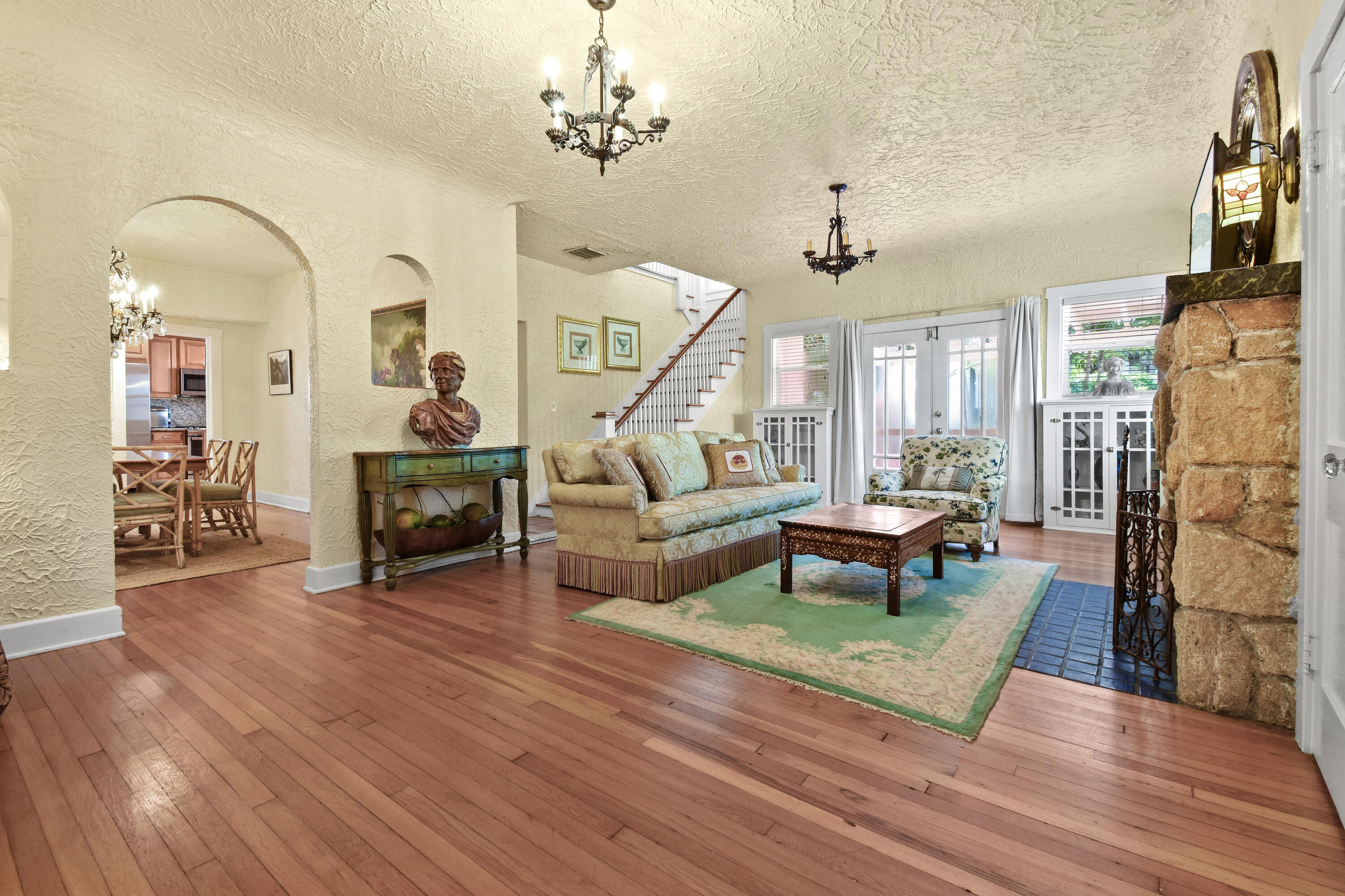 194 Almeria Road West Palm Beach, FL 33405 - Photo 7 of 67 a living room with furniture and a fireplace