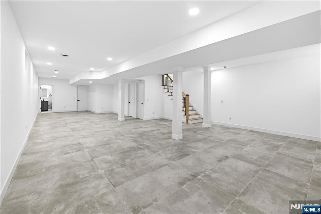 150 Howland Avenue River Edge, NJ 07661 - Photo 36 of 45 a view of a big room with a fireplace