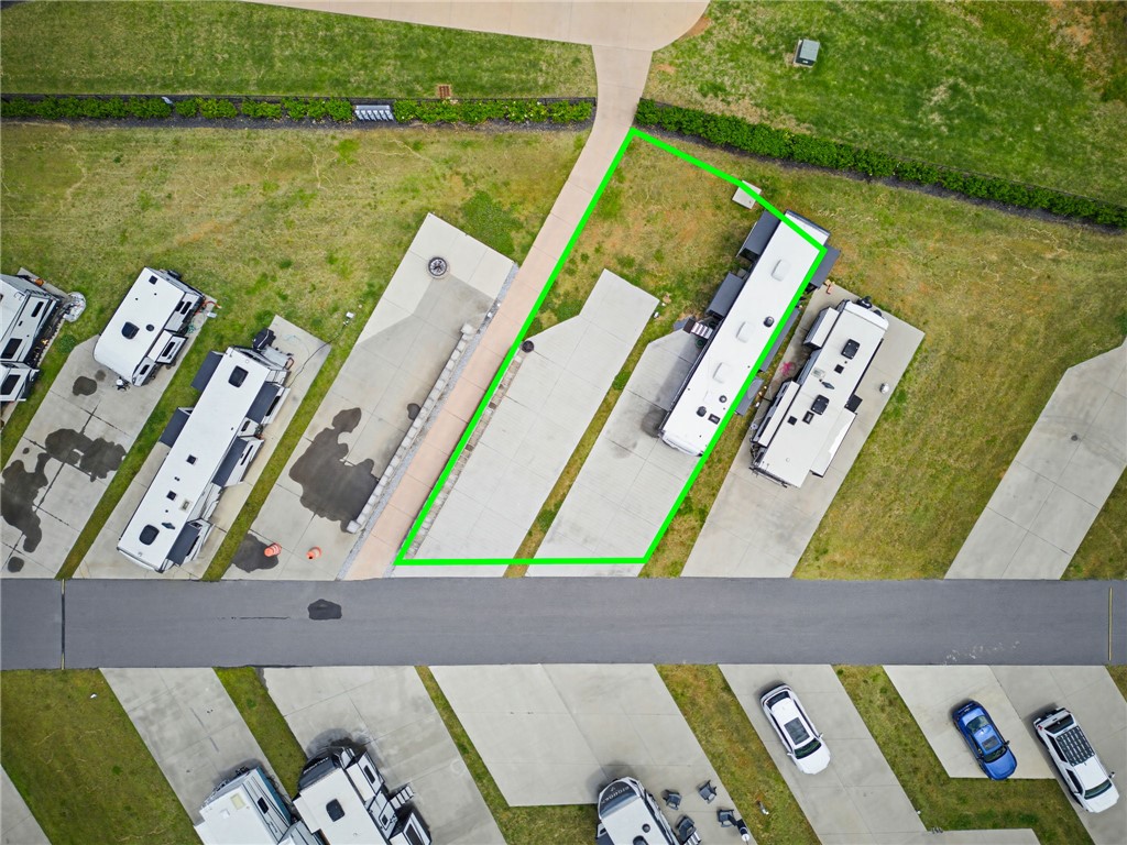 150 Dalton Drive, Unit 331/332 Pendleton, SC 29670 - Photo 13 of 29 Secure your recreational vehicle with a dedicated paved parking space, offering easy access.