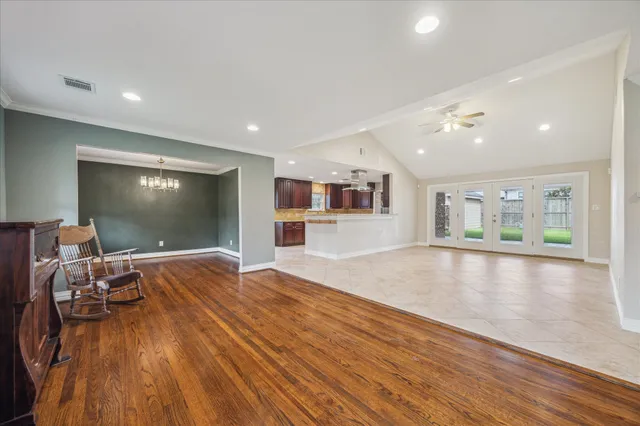 a view of a house with swimming pool and porch