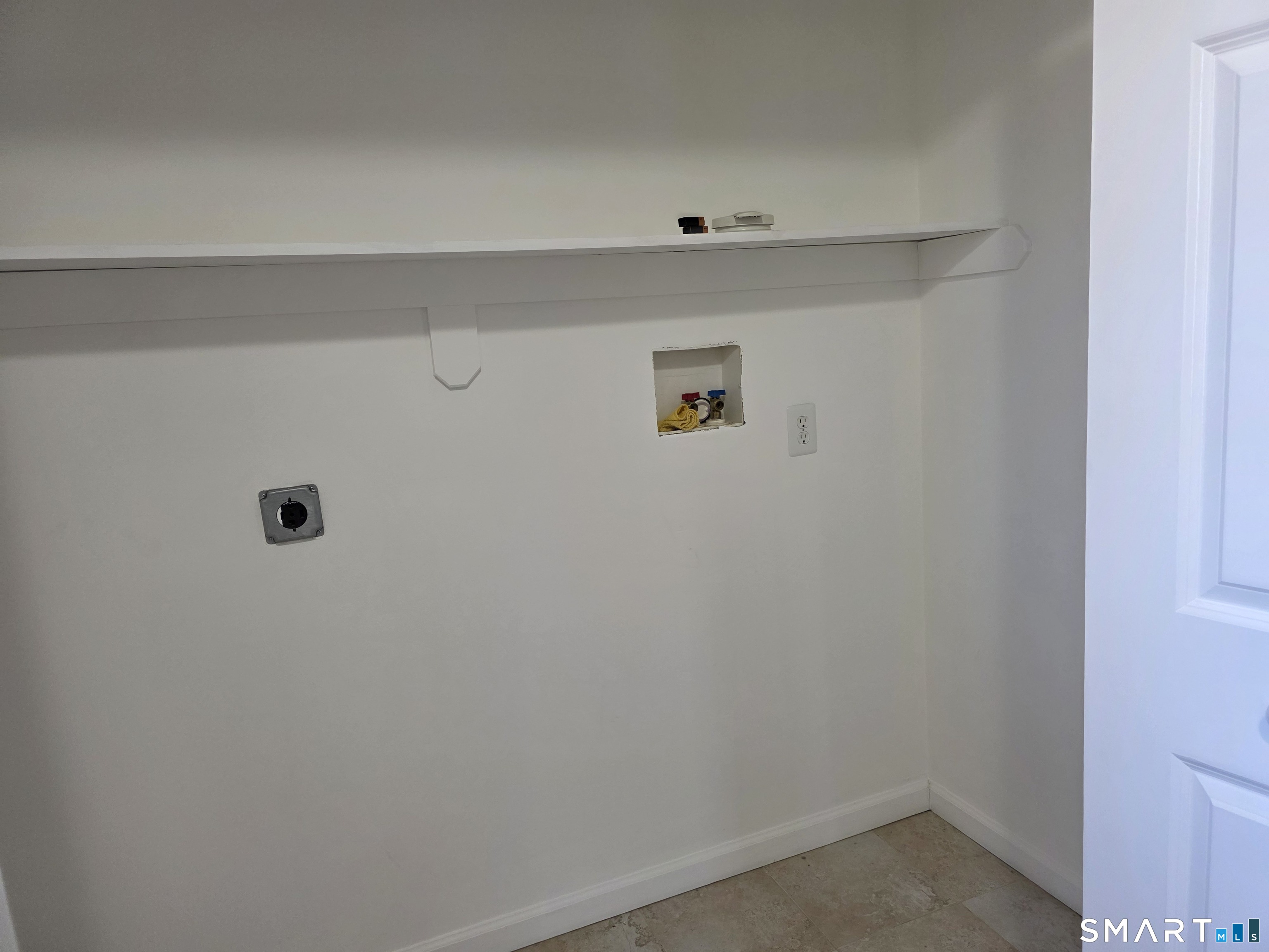 148 Mathewson Street, Unit 609 Griswold, CT 06351 - Photo 16 of 23 a view of utility room