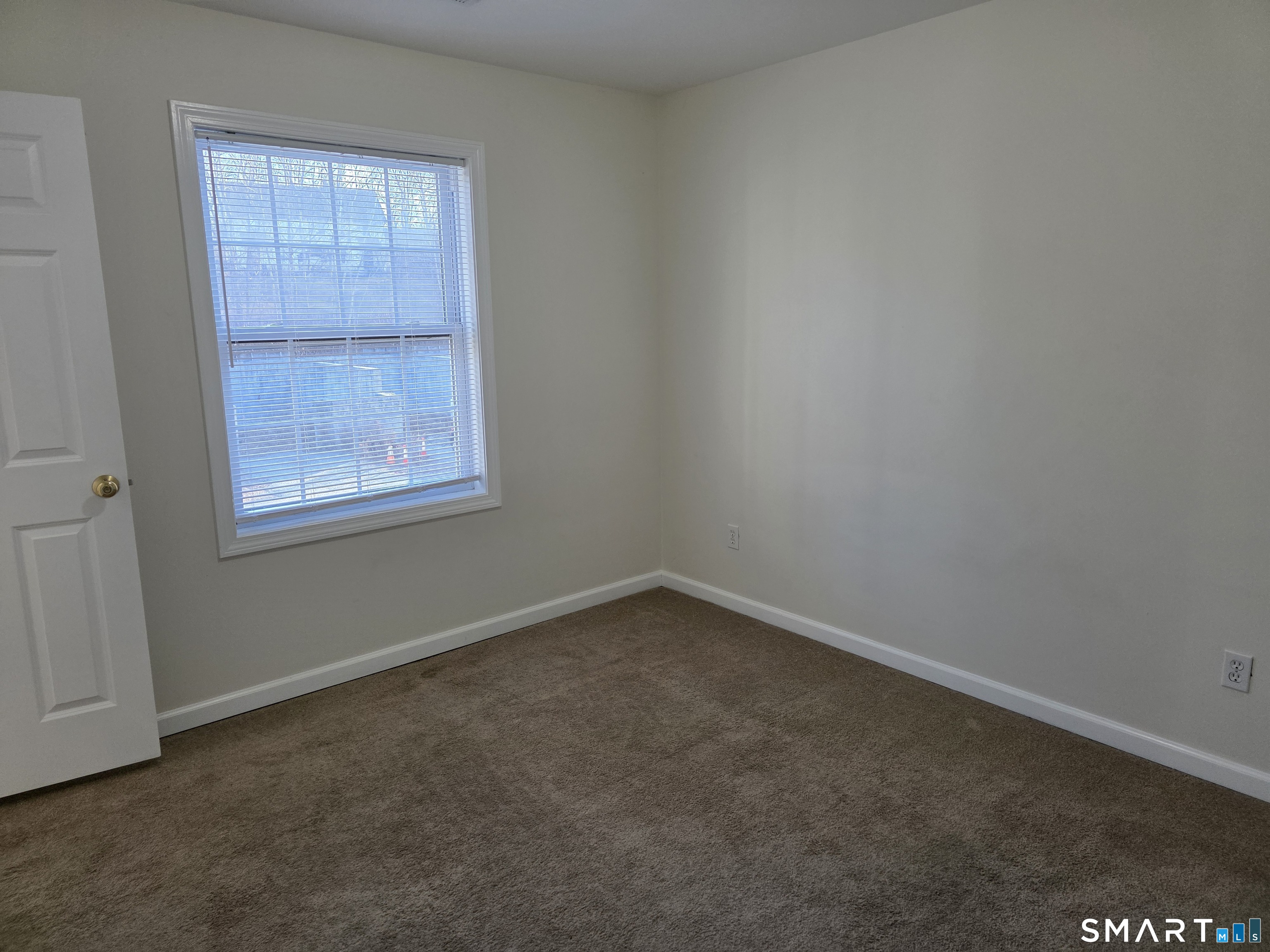 148 Mathewson Street, Unit 609 Griswold, CT 06351 - Photo 17 of 23 an empty room with a window