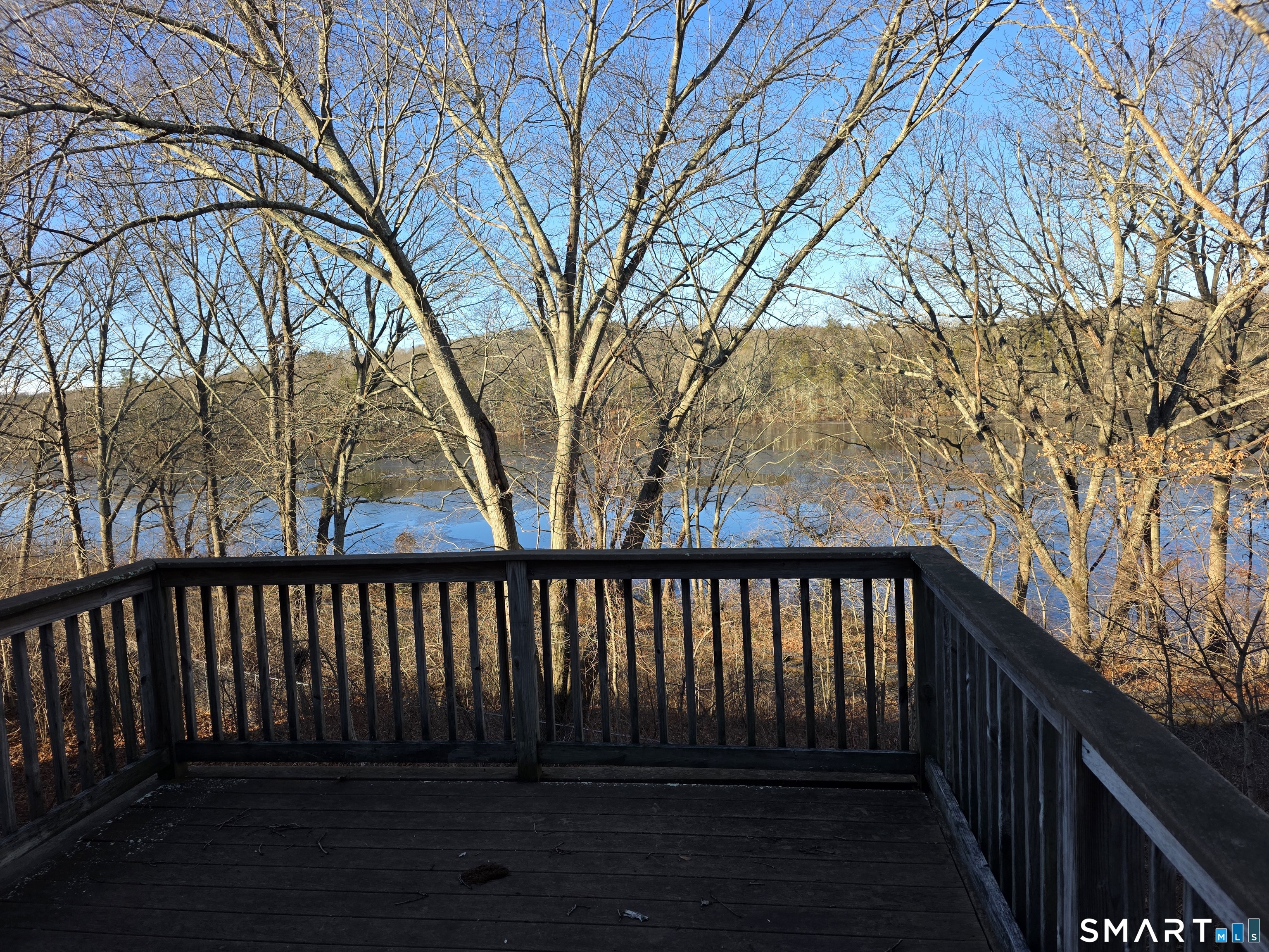 148 Mathewson Street, Unit 609 Griswold, CT 06351 - Photo 10 of 23 a wooden bench sitting in a backyard