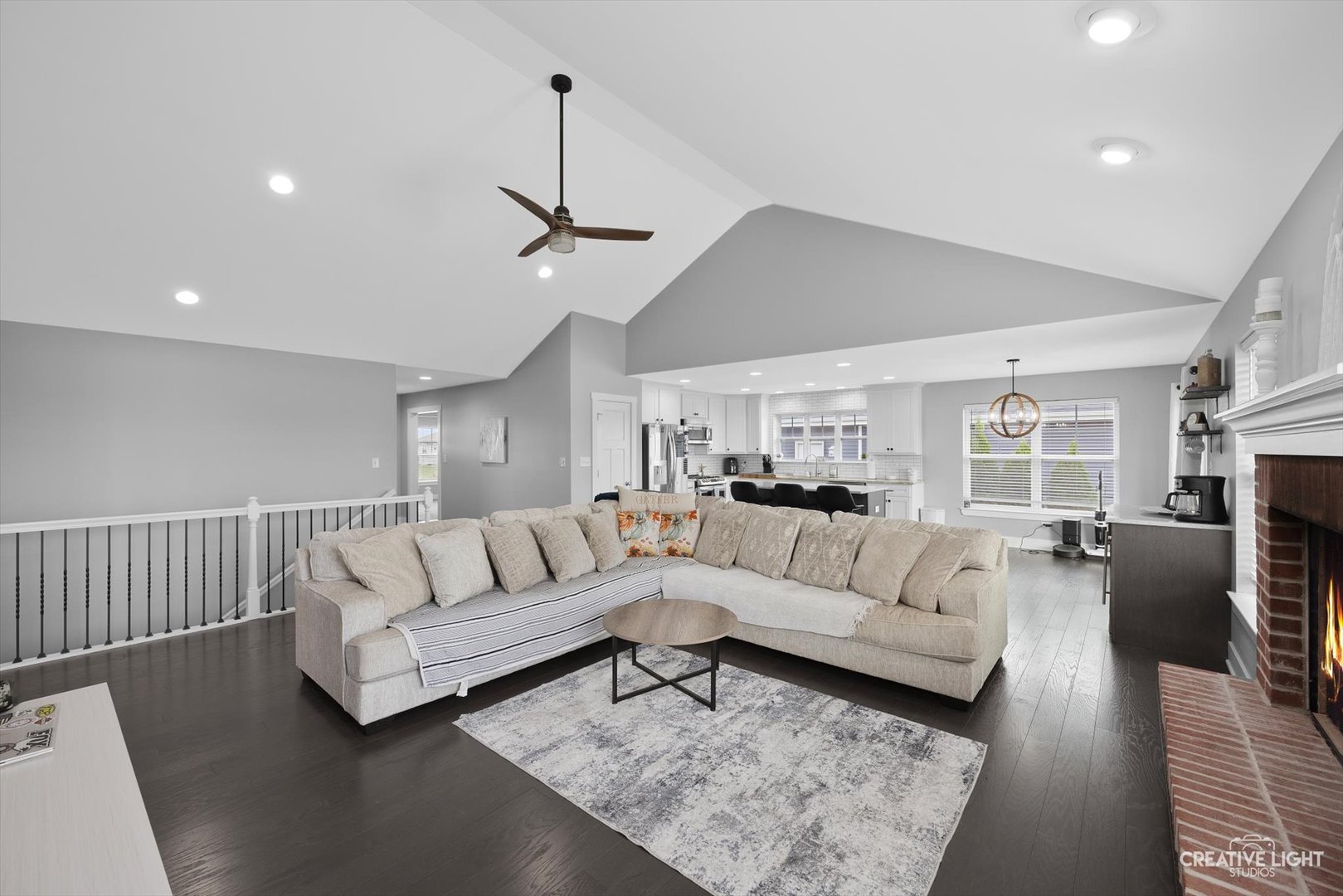 618 Peacock Place Manteno, IL 60950 - Photo 11 of 31 a living room with furniture a couch and a chandelier