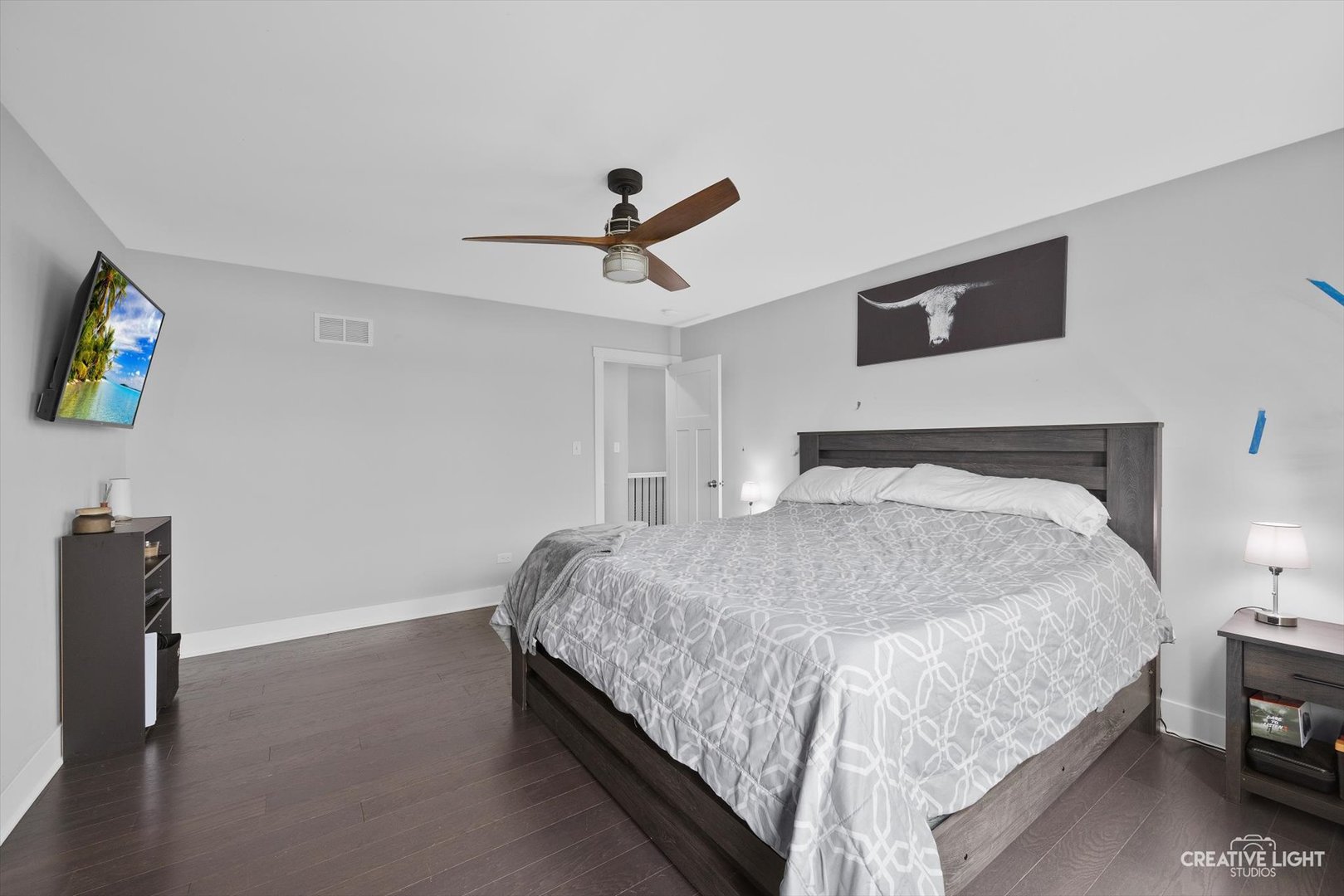 618 Peacock Place Manteno, IL 60950 - Photo 20 of 31 a bedroom with bed and paintings on the wall