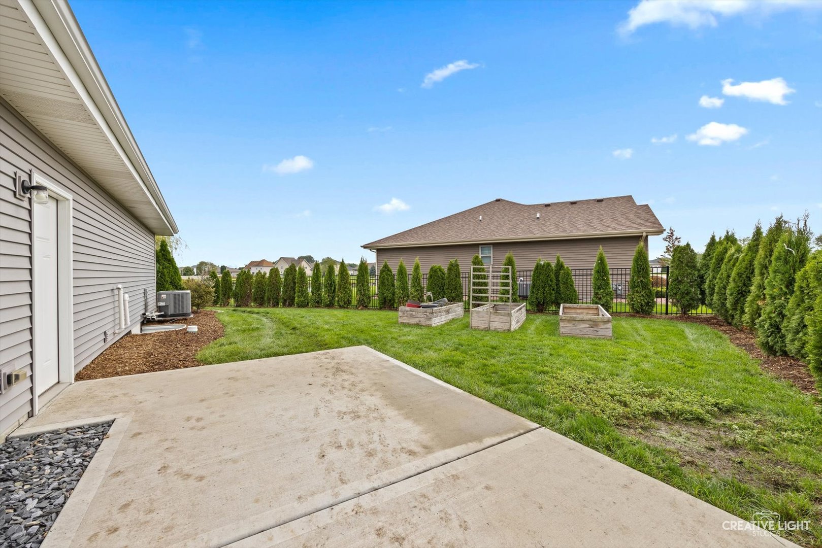 618 Peacock Place Manteno, IL 60950 - Photo 27 of 31 a view of a house with backyard and garden