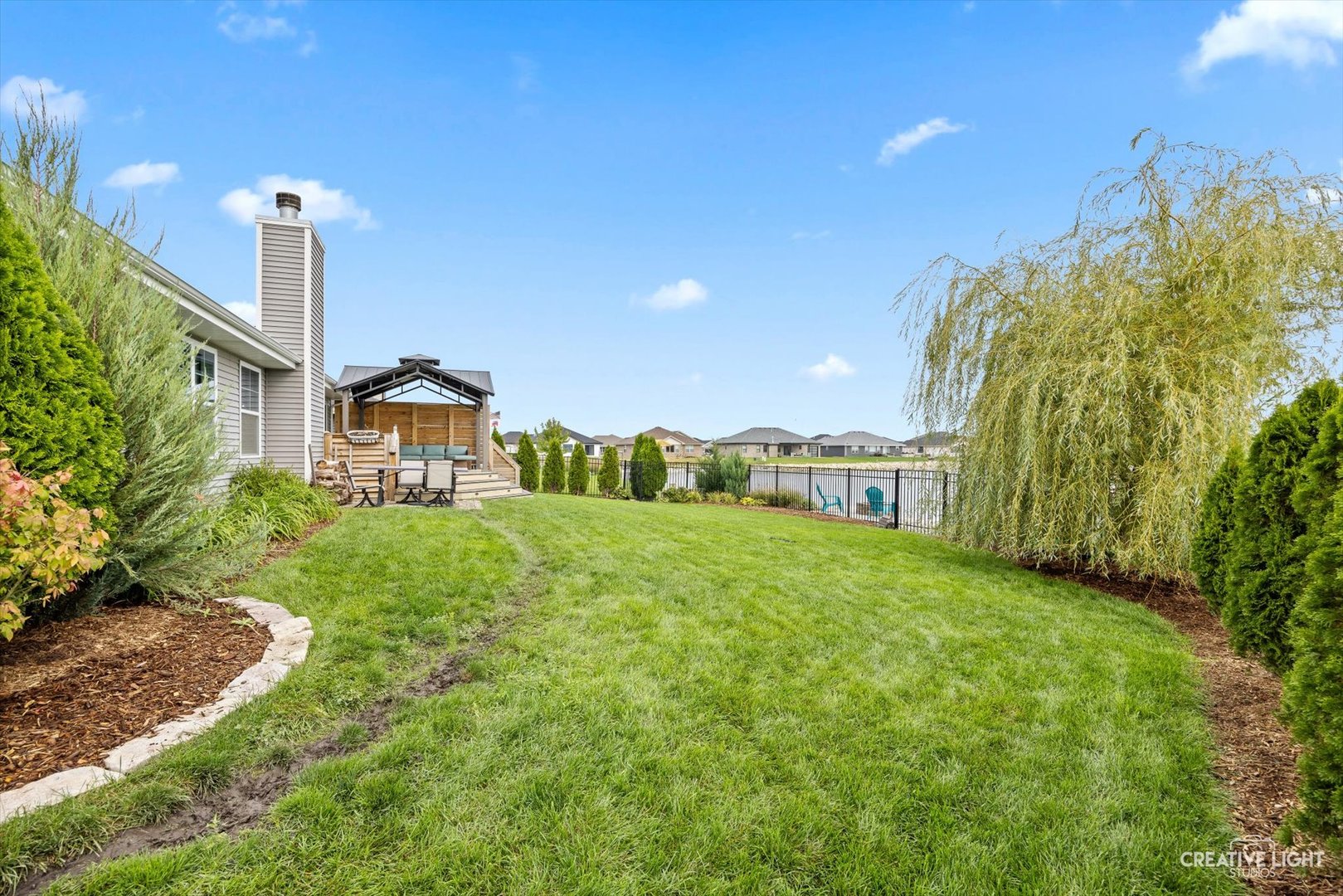 618 Peacock Place Manteno, IL 60950 - Photo 28 of 31 a front view of a house with garden