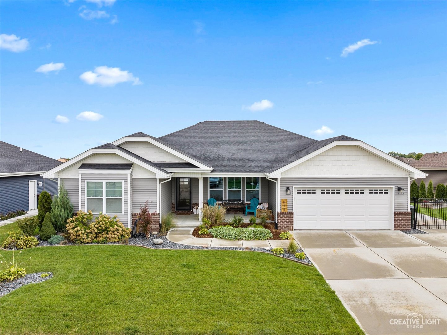 618 Peacock Place Manteno, IL 60950 - Photo 3 of 31 a front view of a house with garden