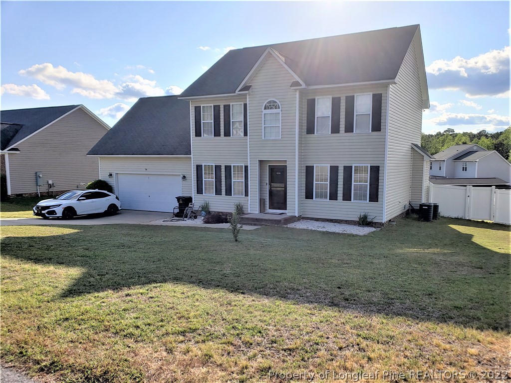 36 Pender Road Spring Lake, NC 28390 - Photo 3 of 7 a front view of a house with a yard