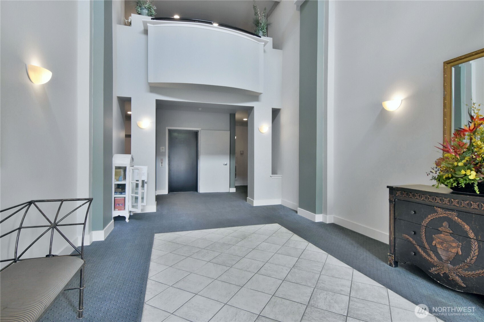 8500 Main Street, Unit F313 Edmonds, WA 98026 - Photo 3 of 24 a view of a livingroom with a furniture and a fireplace