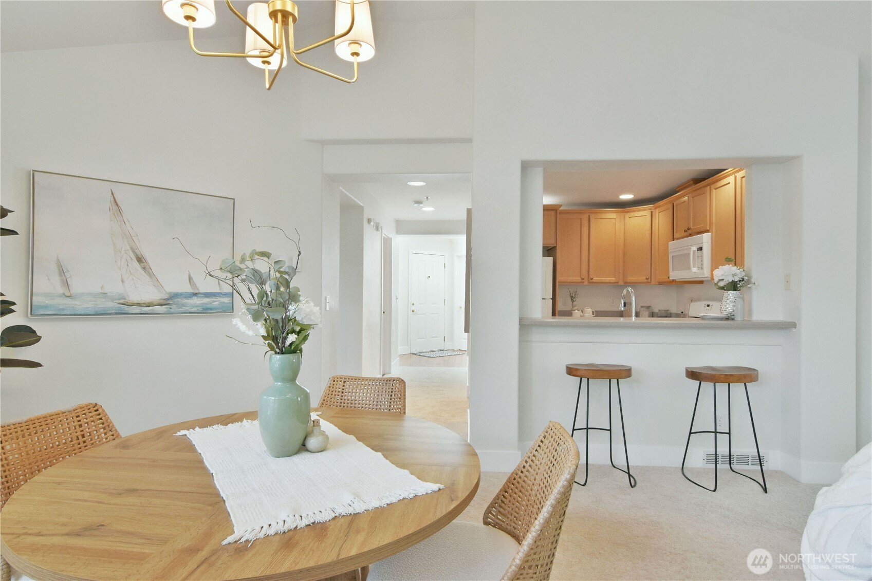 8500 Main Street, Unit F313 Edmonds, WA 98026 - Photo 9 of 24 a view of a dining room with furniture