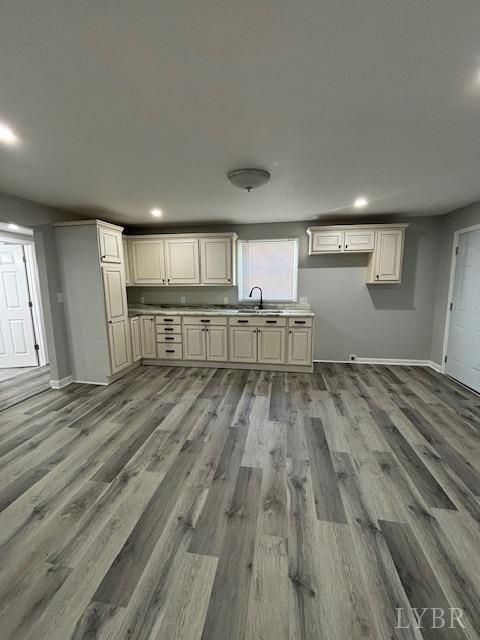 338 Ferry Road Danville, VA 24541 - Photo 5 of 34 a view of kitchen and empty room with wooden floor