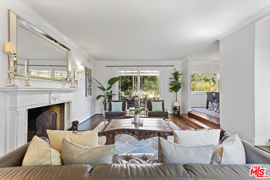 70 Club Road Pasadena, CA 91105 - Photo 3 of 38 a living room with furniture and a fireplace