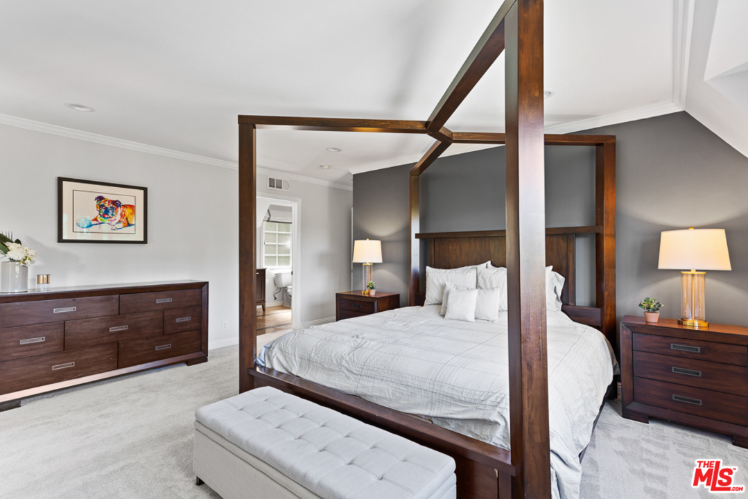 70 Club Road Pasadena, CA 91105 - Photo 22 of 38 a bedroom with a bed and a dresser