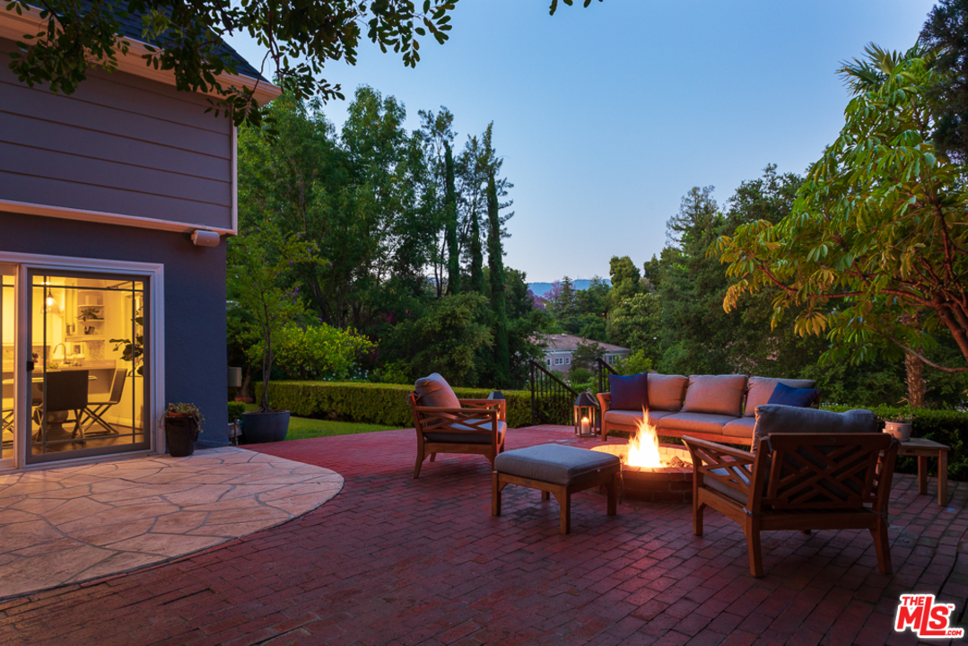 70 Club Road Pasadena, CA 91105 - Photo 27 of 38 an outdoor sitting area with furniture and garden