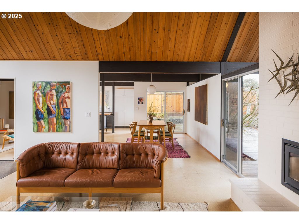 2720 Northwest Forest Avenue Beaverton, OR 97006 - Photo 11 of 40 a living room with furniture and a flat screen tv