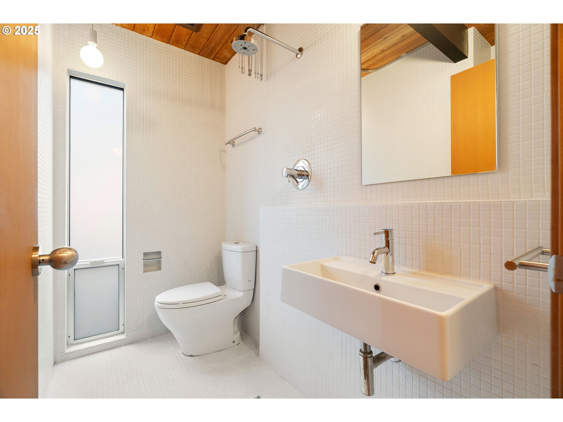 2720 Northwest Forest Avenue Beaverton, OR 97006 - Photo 29 of 40 a bathroom with a sink toilet and shower