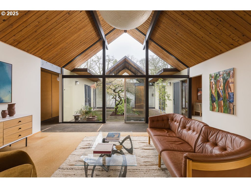 2720 Northwest Forest Avenue Beaverton, OR 97006 - Photo 5 of 40 a living room with furniture and large windows