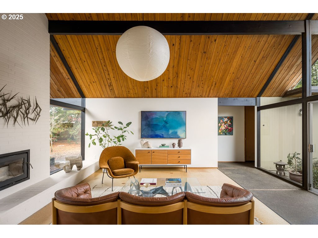 2720 Northwest Forest Avenue Beaverton, OR 97006 - Photo 8 of 40 a living room with a couch and a table