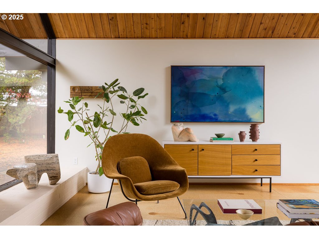 2720 Northwest Forest Avenue Beaverton, OR 97006 - Photo 10 of 40 a living room with furniture and a lamp