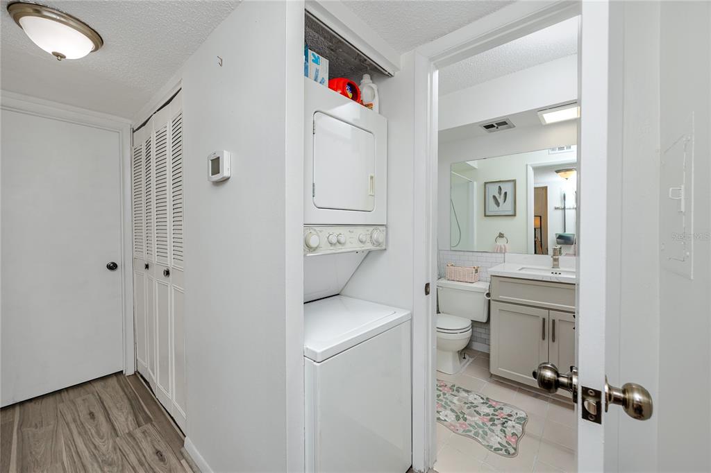 2207 Belleair Road, Unit B30 Clearwater, FL 33764 - Photo 21 of 39 a storage room with a washer and dryer
