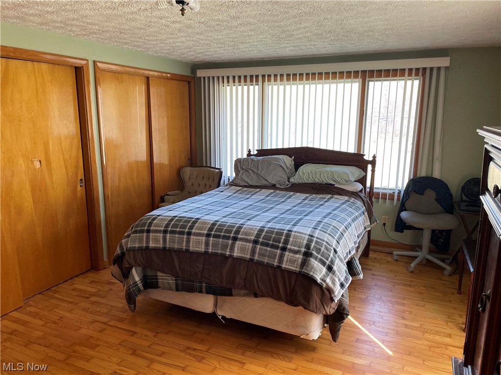 120 Trease Road Wadsworth, OH 44281 - Photo 13 of 35 Bedroom #2. Large windows, hardwood floors, walk-in closets