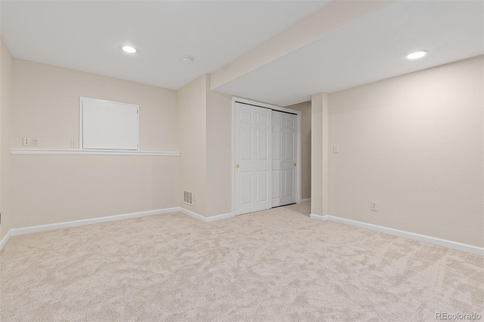 9810 Mulberry Way Highlands Ranch, CO 80129 - Photo 33 of 49 a view of an empty room