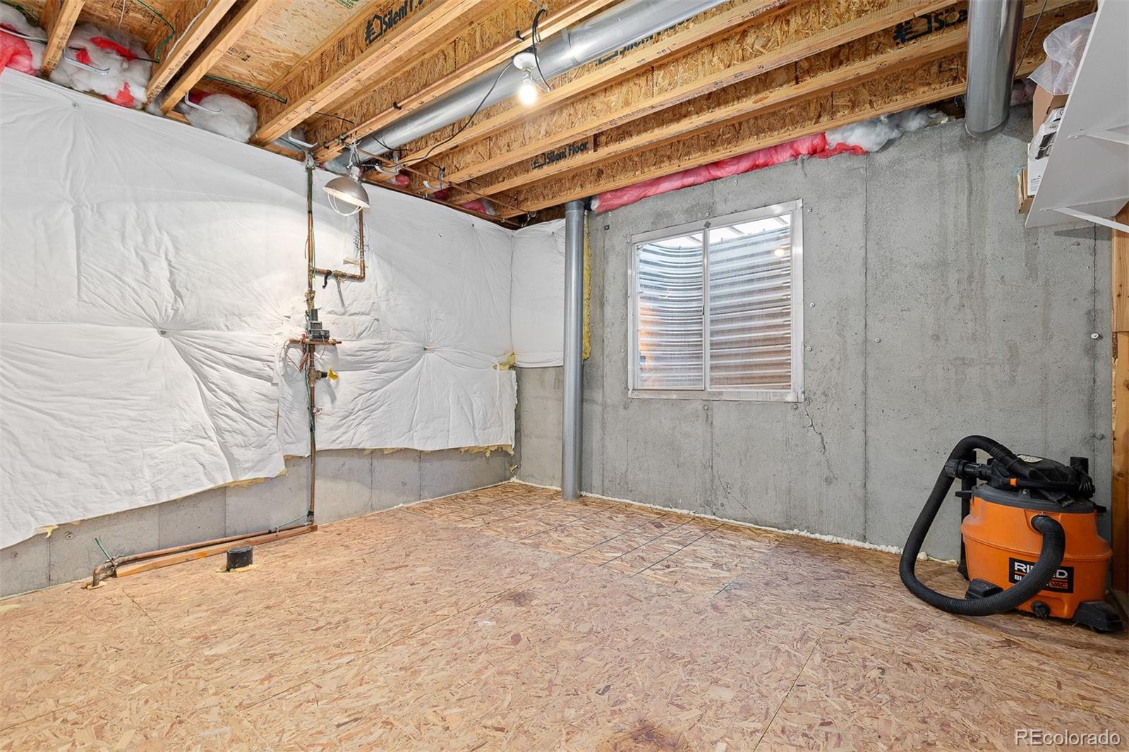 9810 Mulberry Way Highlands Ranch, CO 80129 - Photo 35 of 49 a view of a room with gym equipment