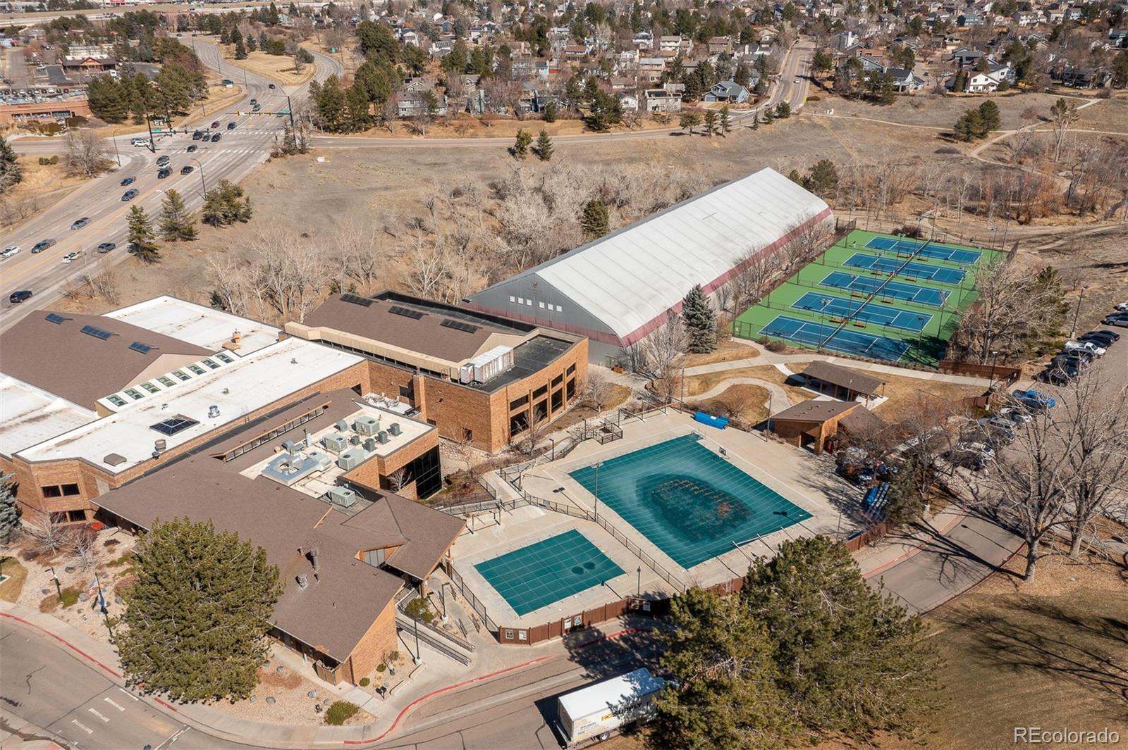 9810 Mulberry Way Highlands Ranch, CO 80129 - Photo 43 of 49 an aerial view of a house with a yard
