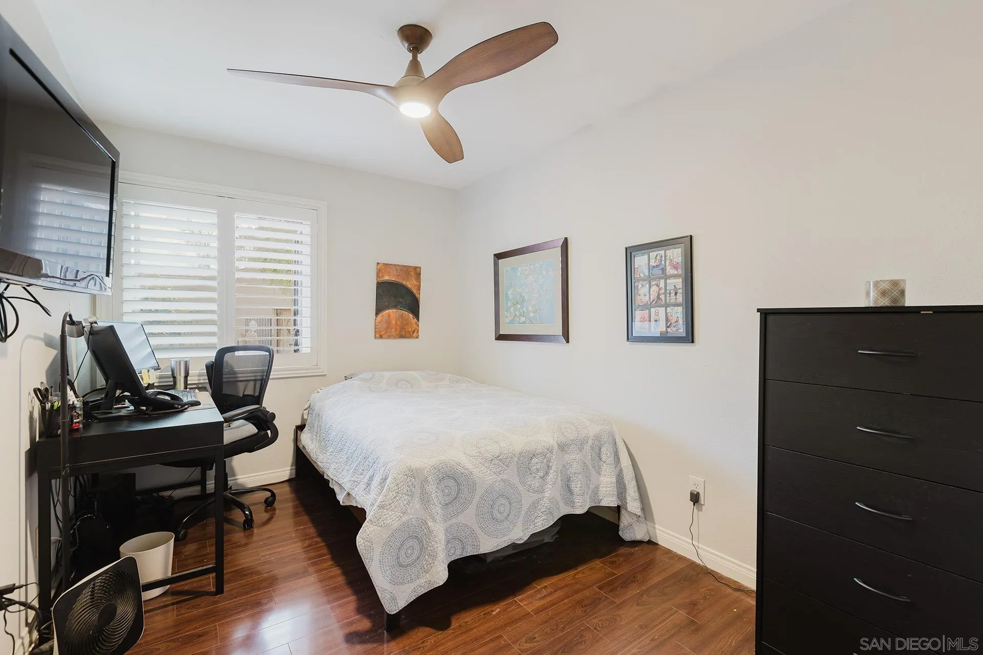 10214 Michala Place Santee, CA 92071 - Photo 13 of 25 a bedroom with a bed and a desk