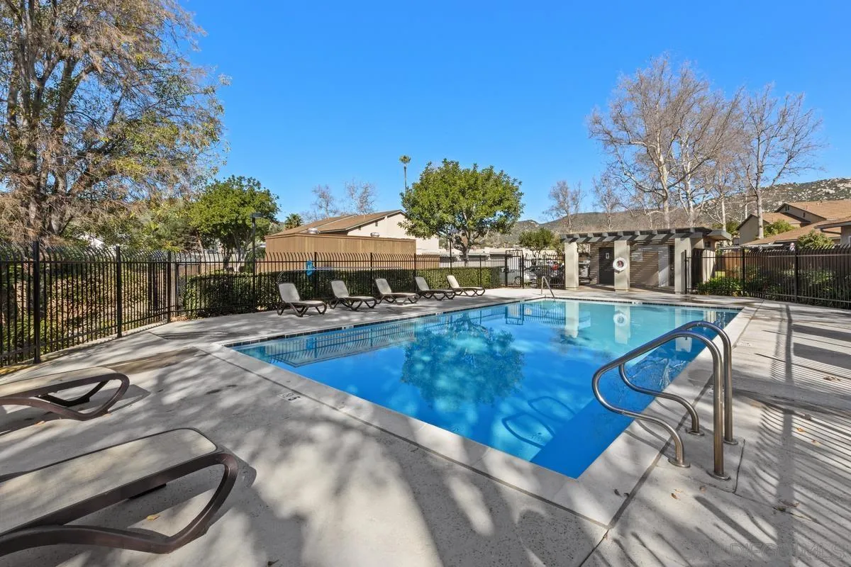 10214 Michala Place Santee, CA 92071 - Photo 22 of 25 a view of a swimming pool with a patio