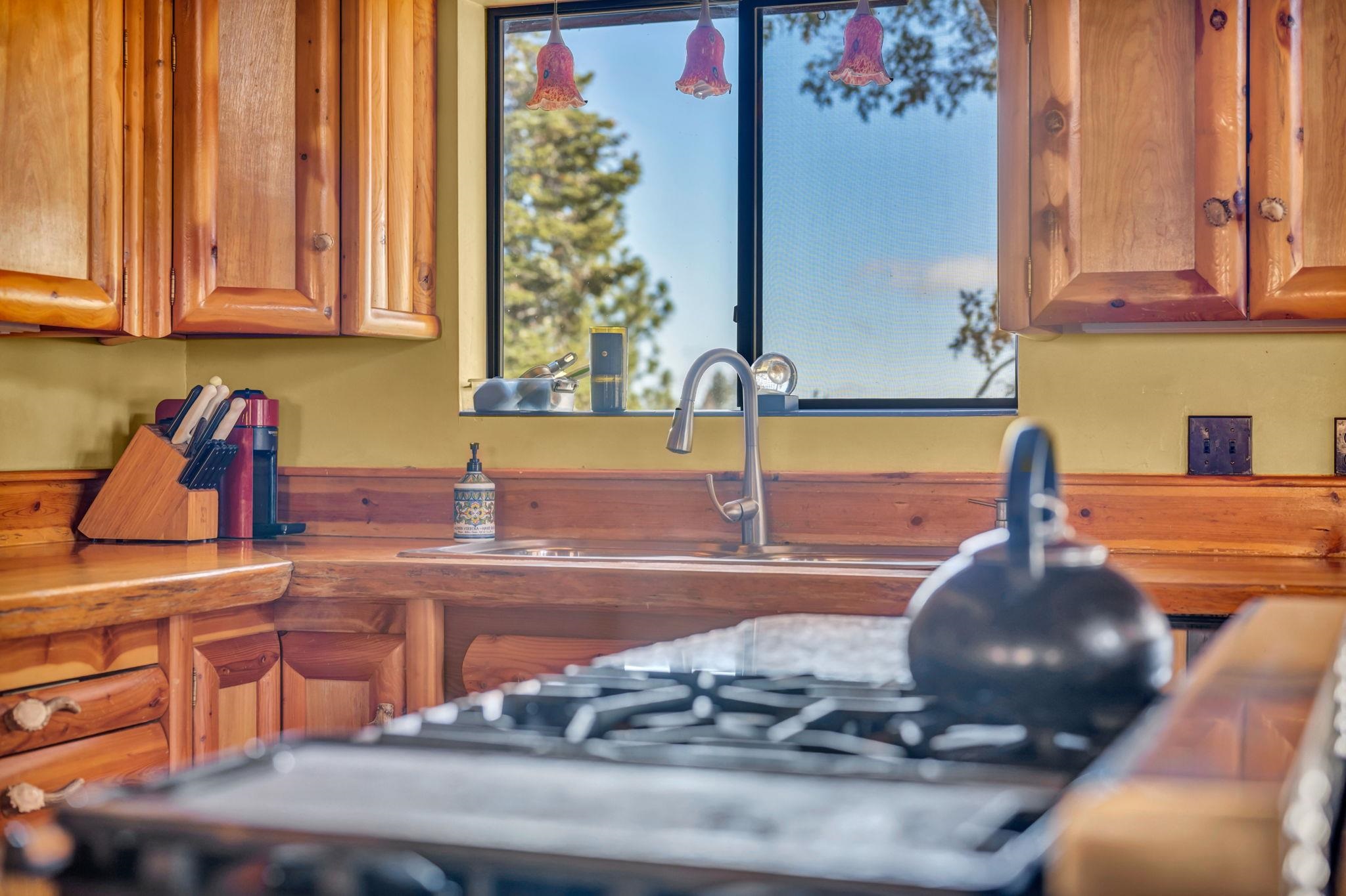 740-935 Sugar Loaf Road Doyle, CA 96109 - Photo 9 of 25 a kitchen with a sink and a window
