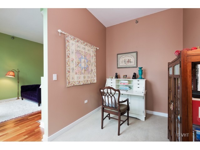 901 West Madison Street, Unit 905 Chicago, IL 60607 - Photo 5 of 10 a workspace room with furniture and a window
