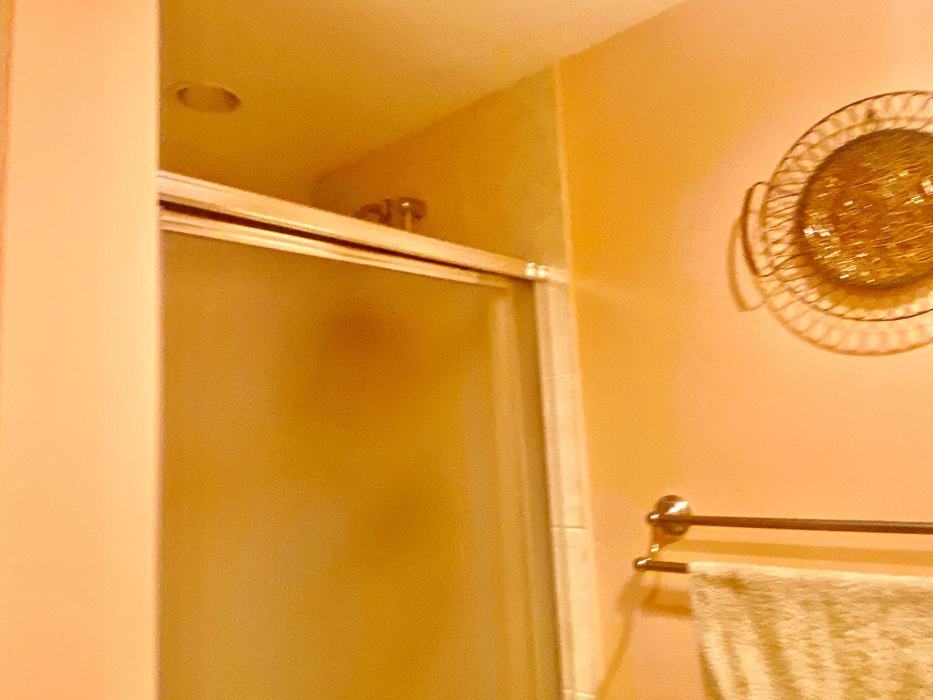 64 Flanders B, Unit 64 Delray Beach, FL 33484 - Photo 18 of 35 a bathroom with a shower