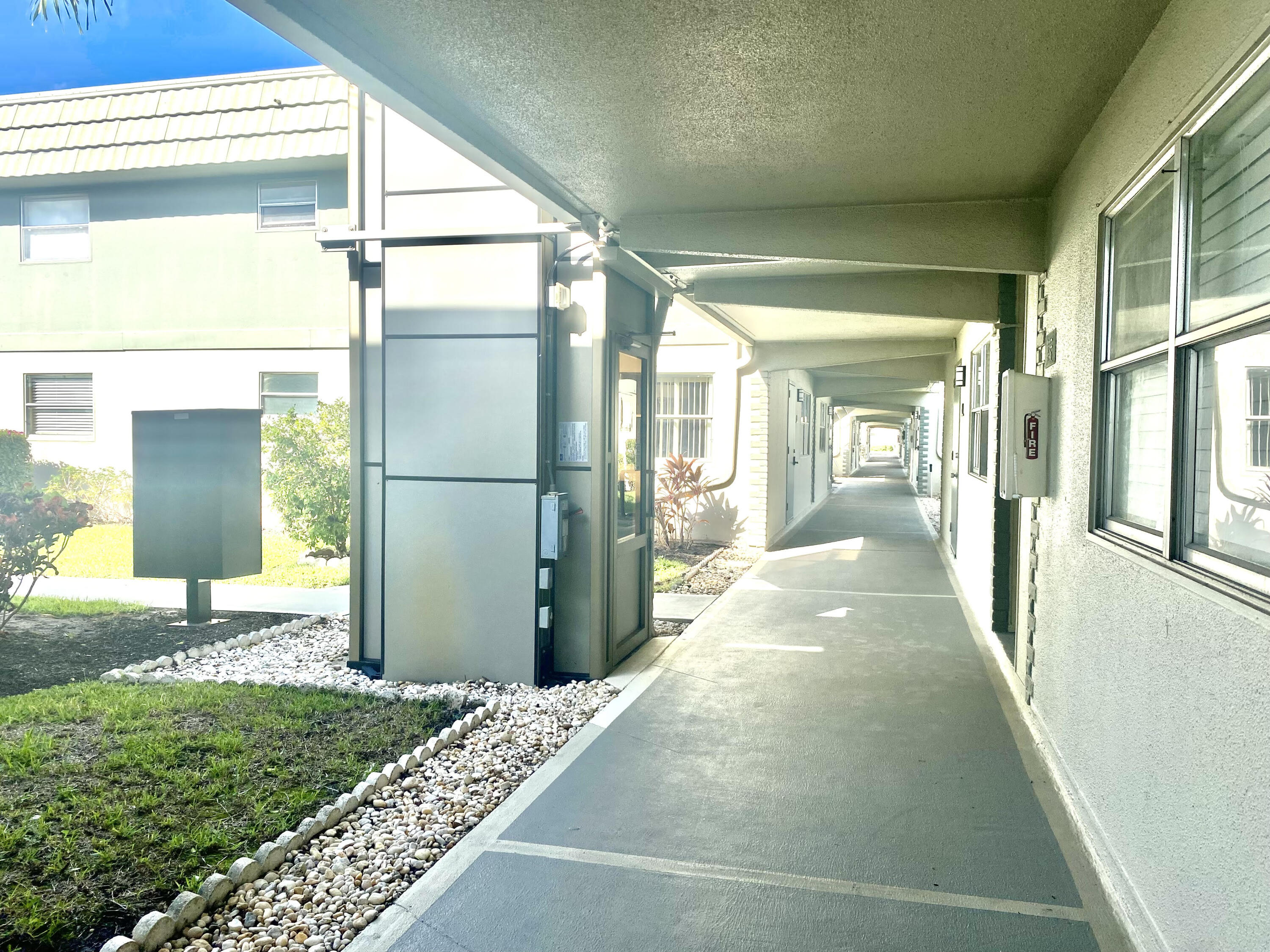 64 Flanders B, Unit 64 Delray Beach, FL 33484 - Photo 21 of 35 a view of a porch