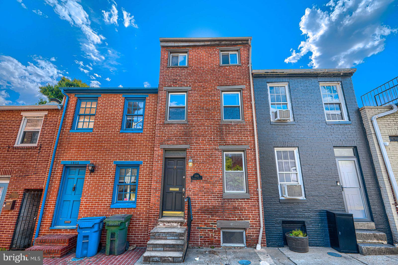 1026 Patapsco Street Baltimore, MD 21230 - Photo 1 of 24 a front view of a house