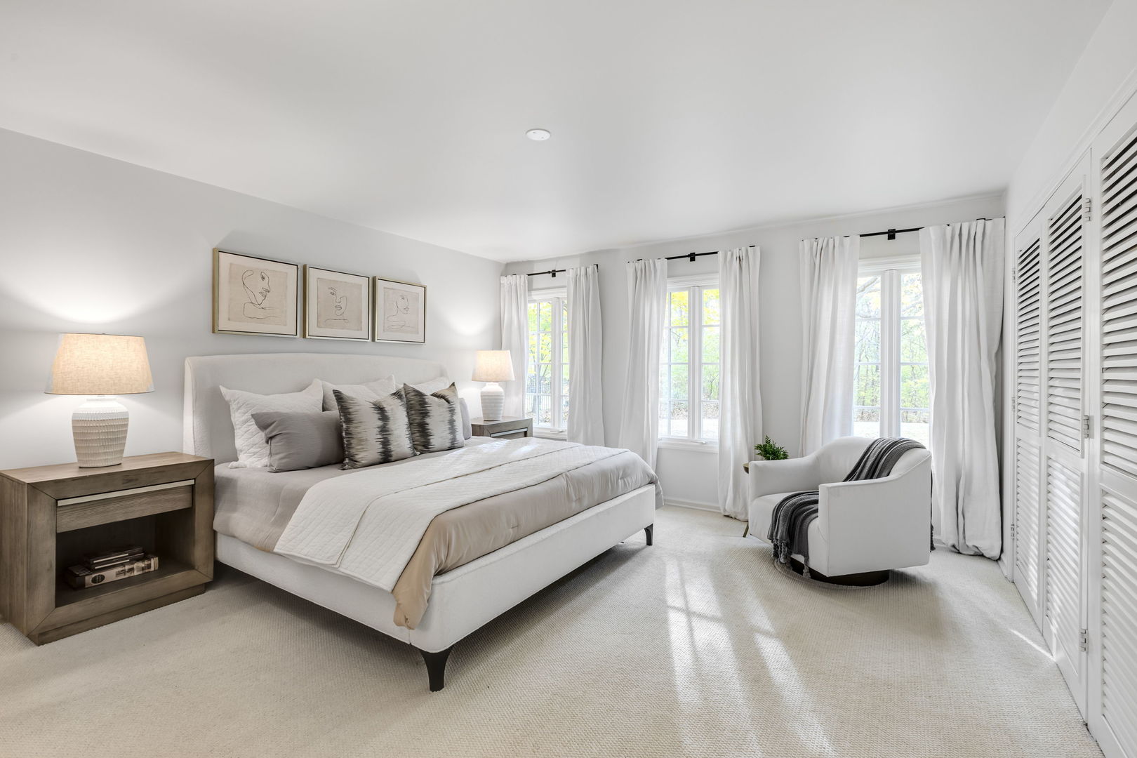 540 Buena Road Lake Forest, IL 60045 - Photo 13 of 35 a spacious bedroom with a bed and a couch