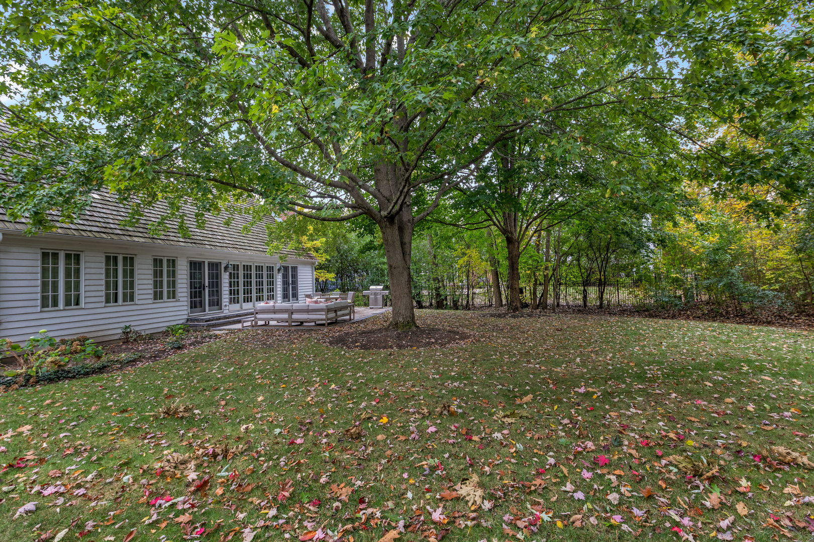 540 Buena Road Lake Forest, IL 60045 - Photo 30 of 35 a view of a house with backyard and sitting area