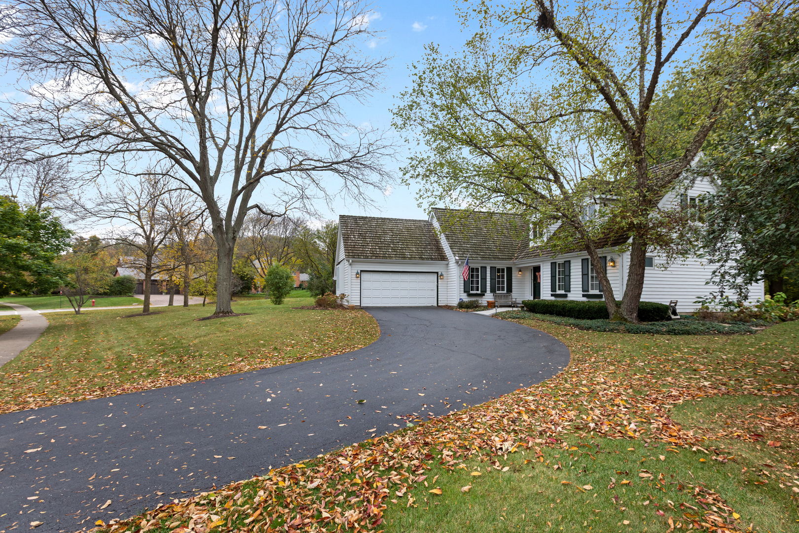 540 Buena Road Lake Forest, IL 60045 - Photo 31 of 35 a front view of a house with a yard and trees