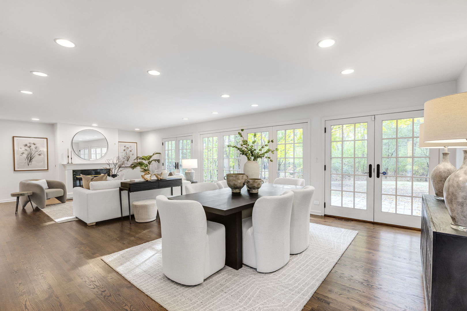540 Buena Road Lake Forest, IL 60045 - Photo 4 of 35 a dining room with furniture a wooden floor and a large window